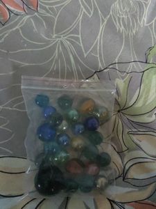 Bag of colorful glass marbles