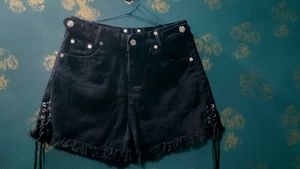 Black Denim Shorts with Fringe and Grommets