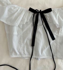 White Ruffle Crop Top with Black Bow