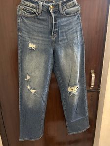 Distressed Blue Denim Jeans