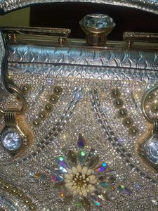 silver solid hand bag