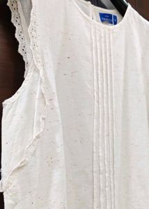 Elegant Sleeveless Cream Top