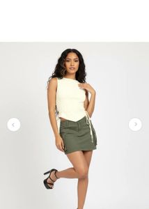 Sleek Sleeveless Cream Top with Tie Detail