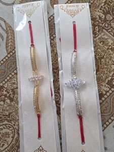 Elegant Rakhi with Crystals. silver and golden 50