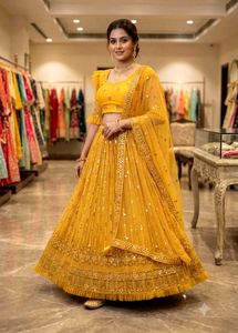 Stunning Yellow Sequined Lehenga Choli