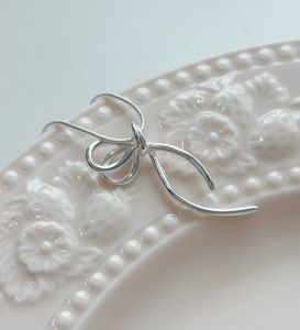 Silver Bow Pendant Necklace