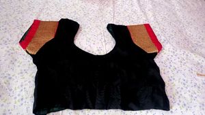 Elegant Black Saree with Gold Border