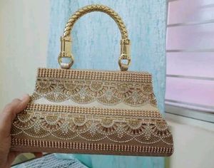 Elegant Gold Embellished Clutch