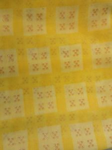 Vibrant Yellow Saree with Square Motifs