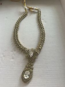 Elegant Gold-Tone Statement Necklace with heels