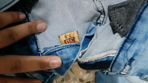 Stylish Blue Denim Jeans with Lace-Up Detail