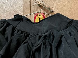 mini skirt black colour with chain , bow and inner