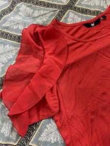 Chic Red Top with Sheer Sleeves