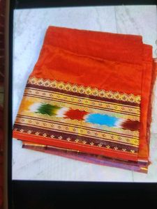 Beautiful Orange Saree with Colorful Border