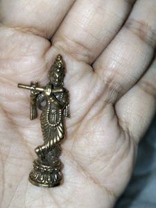 Lord Krishna miniature statue