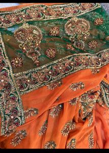 Exquisite Orange Embroidered Saree
