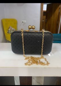Elegant Black Quilted Clutch Bag with Gold Chain