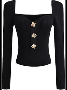 Chic Black Top with gold buttons