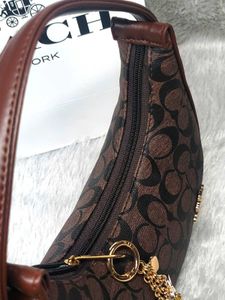 Buy 1 Get ONE  Free Coach moon with charm&amp;carry ba