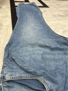 Blue Denim Jeans with Distressed Detail