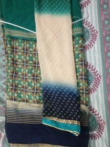 Elegant Teal saree with Intricate Print and unstit