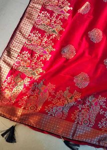 Vibrant Pink Saree with Peacock Motifs