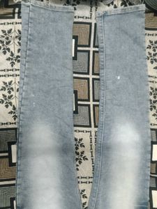 Stylish Blue Denim Jeans with Yellow Accent