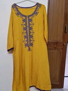 Elegant Yellow Kurta with Embellished Neckline