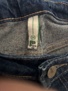 Flared Dark Wash Denim Jeans.