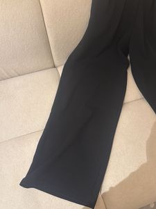 Chic Black Wide-Leg Pants with Gold Buckle
