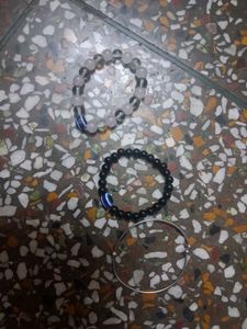 Beaded Bracelet with Blue Charm