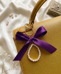 Elegant Pearl &amp; Bow Keychain Charm