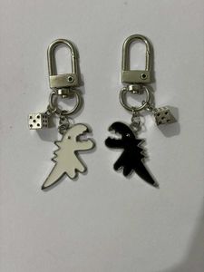 Dinosaur Dice Keychain Set