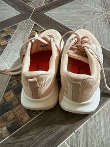 peach color sneakers
