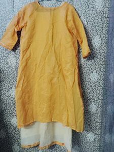 Elegant Off white colour Kurti with Shrug