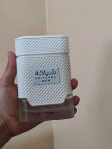 Empty bottle of Khadlaj Shiyaaka Snow Perfume