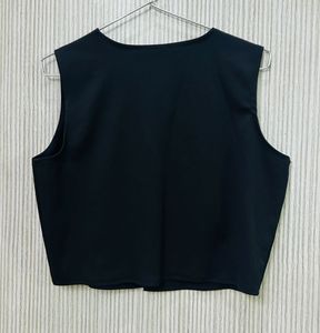 Chic Black Sleeveless Top with Gold Buttons