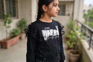 Black Top with "Stay Happy" Print