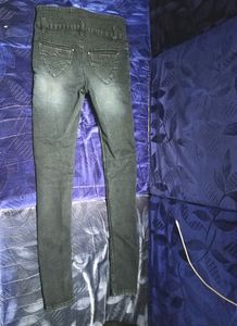 Distressed High-Waisted Skinny Jeans