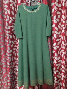 Elegant Green Kurta with Embellished Neckline