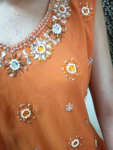 Elegant Orange Embroidered Kurta Set