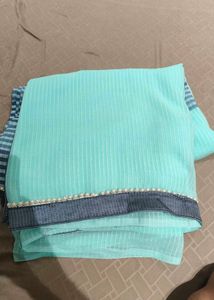 Beautiful Teal Saree with Pearl Border