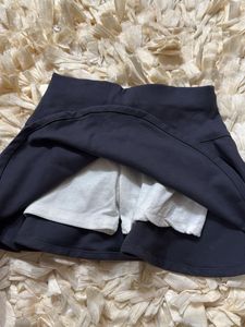 Cute Dark Skirt with Embellishment