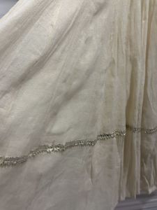 Elegant Cream Kurta Set with Embellished Neckline