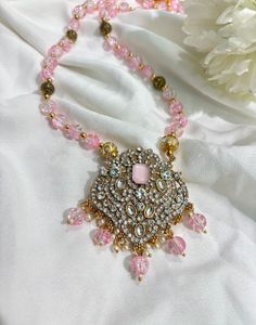 Stunning Pink beaded necklace with statement penda