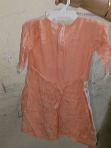 Peach Kurti with Intricate Embellishments