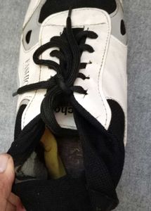 Stylish White and Black Sneakers
