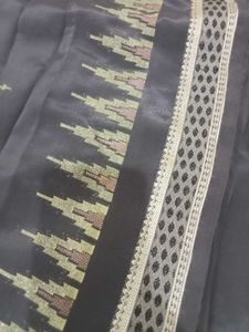 Elegant Grey Saree with Intricate Border