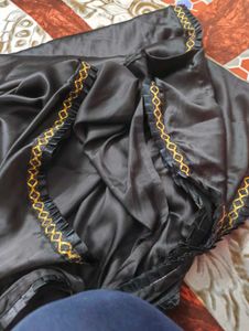 Elegant Black Silk Saree with Gold Border