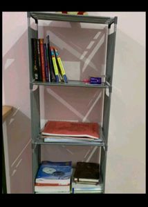 Tall Shelf with Assorted Books
